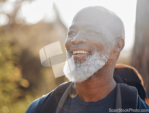 Image of Happy hiking, senior black man and nature walking, forest adventure or outdoor travel journey. Person or elderly hiker with backpack trekking in woods for retirement health, fitness and wellness