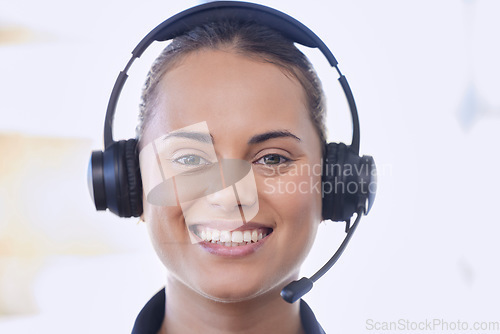 Image of Call center, portrait and happy woman, consultant or agent in customer support, virtual communication and consulting service. Young advisor, telecom person or friendly crm worker face in a headset