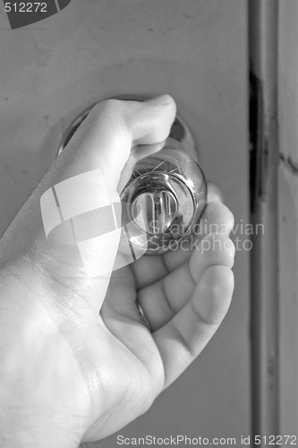 Image of Turning the Doorknob