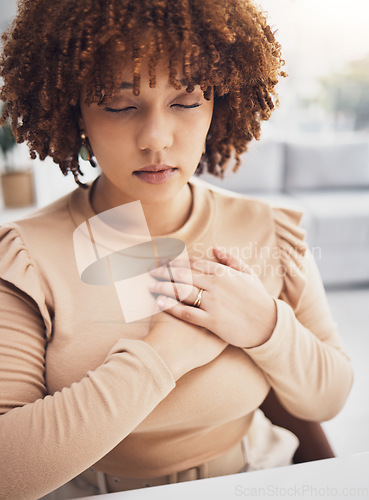 Image of Black woman, breathing exercise and stress mindfulness of a remote worker doing meditation. Breathe, heart rate awareness and meditating young female try to relax with zen activity in a house