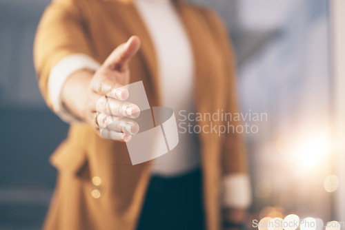 Image of Business woman stretching her hand for a shaking hands for greeting, welcome or partnership in office. Company, corporate and female employee with handshake gesture for agreement in modern workplace.