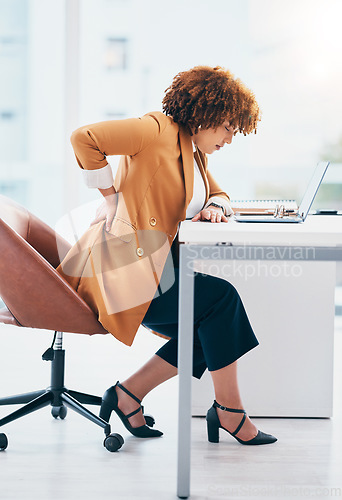 Image of Black woman in business with back pain, burnout and stress, stiff muscle from spine injury and overworked. Female worker at desk, corporate and medical emergency with health problem and strain