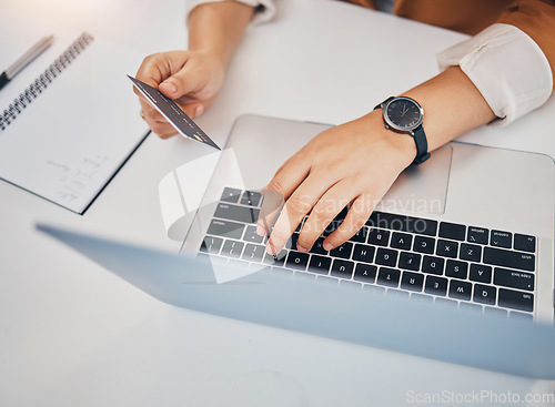 Image of Hands, laptop and typing with credit card for black woman in office, e-commerce and shopping on web. Corporate executive, computer and payment for discount, sale and fintech cybersecurity at desk