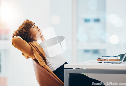 Image of Relax, business and a black woman finished with tasks in the office, resting or breathing at her desk. Success, peace and calm with a female employee relaxing after a job well done or completed