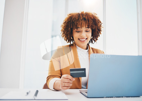 Image of Black woman, laptop and office with credit card for e-commerce or shopping on web with smile for cybersecurity. Corporate executive, computer and ecommerce for retail, discount and fintech at desk