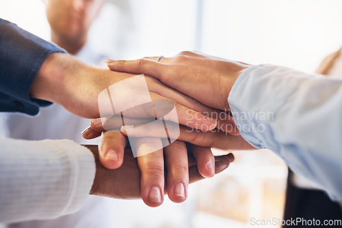 Image of Teamwork, support and motivation with hands of business people for community, diversity and mission. Strategy, mindset and solidarity with group of employee for faith, connection and team building