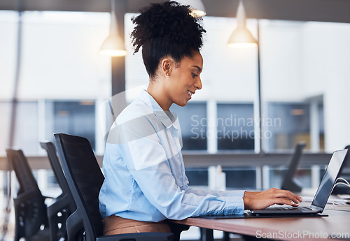 Image of Laptop, flare and review with a business black woman typing an email or report while sitting in the office boardroom. Computer, internet and networking with a female employee working on an appraisal
