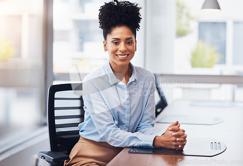 Image of Black woman, business and smile portrait at desk in office with pride for career or job as leader. Young entrepreneur person happy about growth, development and mindset to grow corporate company