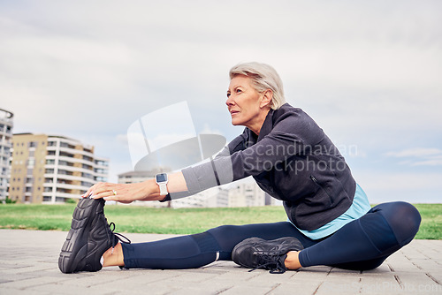 Image of Woman, stretching exercise and sports on sky mockup, park ground and training motivation in Miami. Senior female warm up legs outdoor for workout, fitness and thinking of healthy mindset, body or run