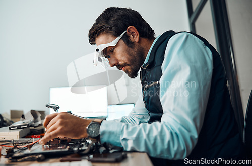 Image of IT man, technician or magnifying glasses in motherboard fix, engineering workshop or database update. Worker, CPU or circuit board in repair, maintenance or software upgrade in information technology