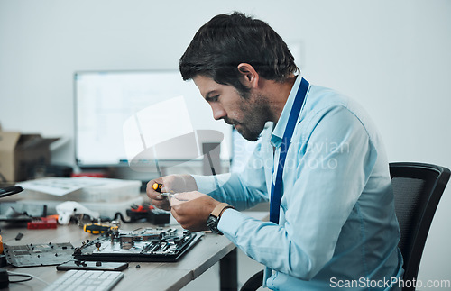 Image of Man, circuit and tools at repair workshop for maintenance, computer tech or industry with focus. Technician, motherboard and information technology at desk with electronics, engineering and service