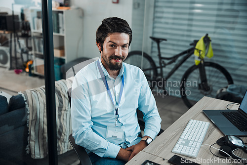 Image of Man, portrait and IT technician in an office for computer software, technology or problem solving at desk. Happy engineer person doing maintenance, programming and digital development project