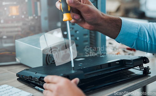 Image of Laptop, technician and IT repair with screwdriver for computer hardware maintenance. Hands of tech support or electrician person with tools to upgrade information technology problem and programming