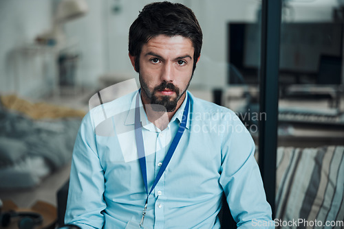 Image of Technician, programmer and portrait of a man in a office for engineering service, maintenance or repairs. Information technology, professional and serious male IT engineer working in a workshop.