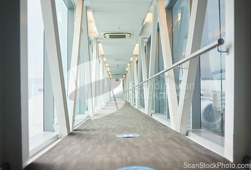 Image of Airport backgrounds, terminal hallway and corridor for traveling, journey and covid transport regulations. Empty walkway for airplane flight, immigration and interior design tunnel space for walking