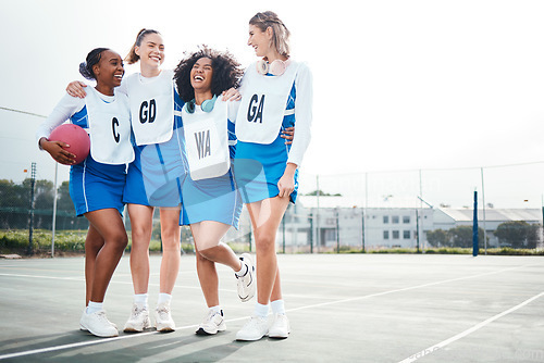 Image of Hug, women or team support in netball training game, exercise or sports workout on college court. Teamwork, fitness friends group or excited athlete girls with happy smile talking or bonding together