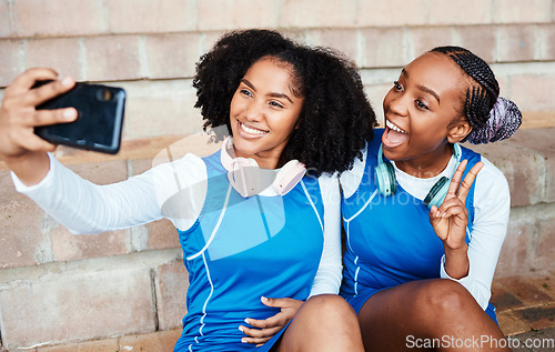 Image of Netball selfie, sports women or team on break with social media post, happy training update and relax on floor. Athlete black people, teenager or gen z friends in profile picture and peace emoji hand