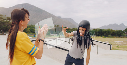 Image of Laughing, funny and interracial couple bonding while roller skating and learning to click fingers. Playful, applause and woman clapping for a black man clicking while on skates at a park for fun