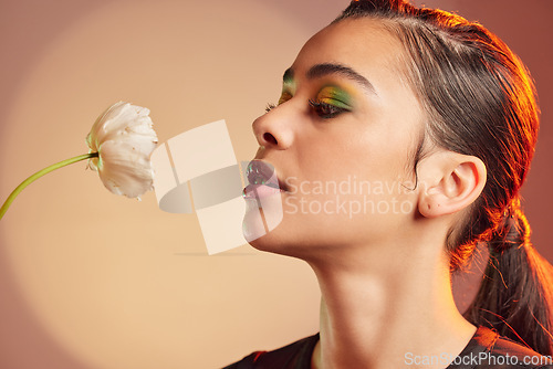 Image of Makeup, beauty and profile of woman with flower for luxury cosmetics, skincare products and fashion. Neon studio, creative art deco and face of girl with plant for self care, glamour and satisfaction