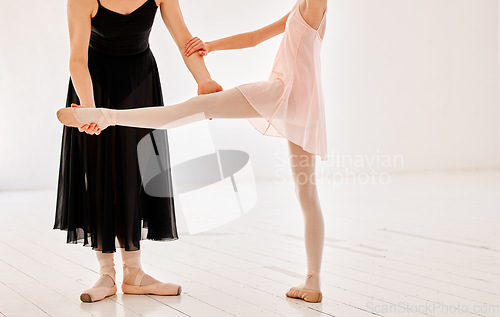 Image of Closeup, ballet and mentor with girl, balance and practice for performance, routine and fitness. Zoom, female ballerina and trainer help with training, legs and learning for show and dancing academy