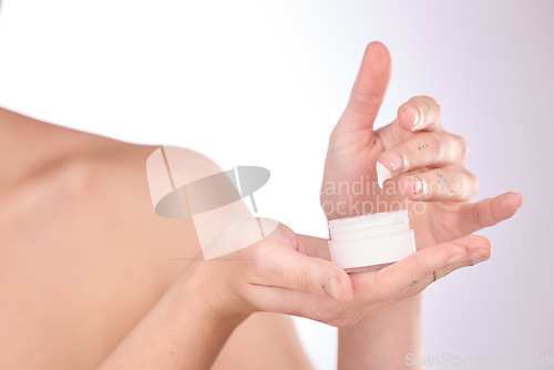 Image of Cream, jar and woman skincare for hands, cosmetics and dermatology makeup on studio background. Closeup, beauty lotion and model with container for healthy glow, shine and aesthetic wellness product