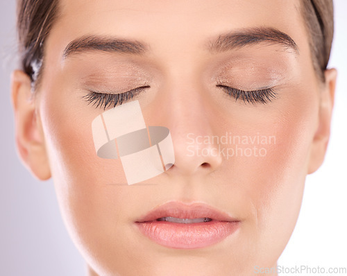 Image of Woman, face and eyes closed for makeup, cosmetics and laser transformation on studio background. Closeup female model, facial aesthetic and skincare, beauty glow and chemical peel results