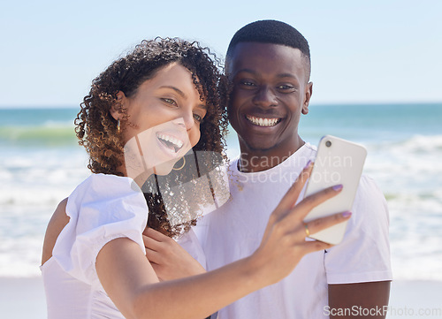 Image of Black couple smile, selfie and sea water with a woman and man together for social media profile picture. Love, care and summer travel of young people outdoor with freedom on a holiday with happiness