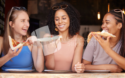 Image of Woman, friends and smile for pizza, food or eating at restaurant together in friendship. Happy hungry women smiling and relaxing on fun date, socializing or bonding at cafe enjoying Italian meal