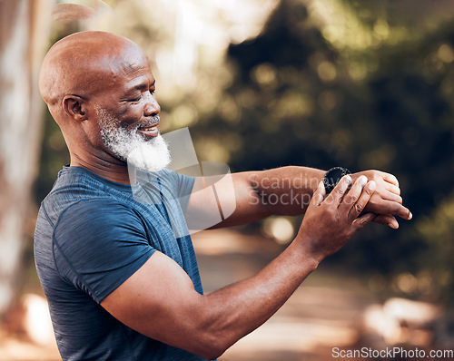 Image of Smart watch, senior man and fitness with exercise and mockup screen to check time performance. Hands of black person with smartwatch health app for heart, steps and clock or workout progress outdoor