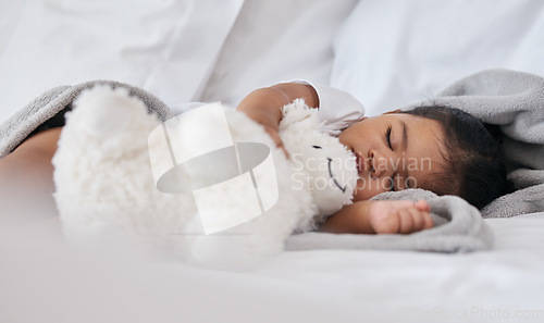 Image of Sleeping, teddy bear and relax with baby in bedroom for cute, comfortable and dreaming. Innocence, young and rest with tired child at home for and napping with toy for bedtime, youth and sweet