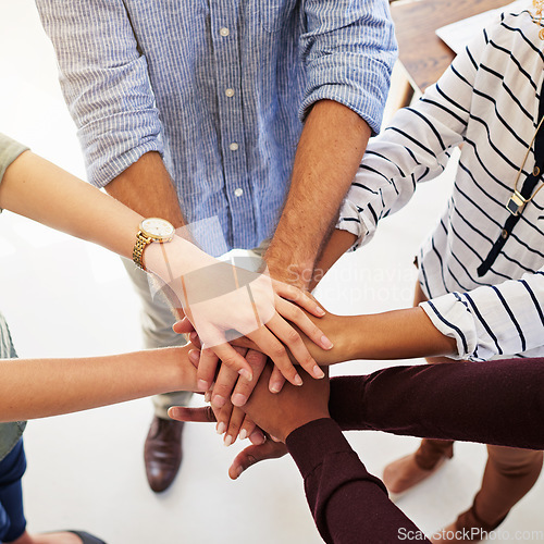 Image of Business people, hands and unity in collaboration for teamwork, goal or diversity above at the workplace. Hand of group piling in team trust for community, motivation or agreement together