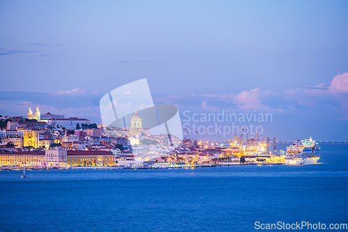 Image of View of Lisbon over Tagus river in the evening. Lisbon, Portugal