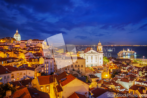 Image of View of Lisbon from Miradouro de Santa Luzia viewpoint at evening. Lisbon, Portugal
