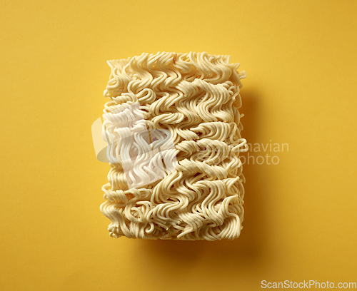 Image of noodles on yellow background