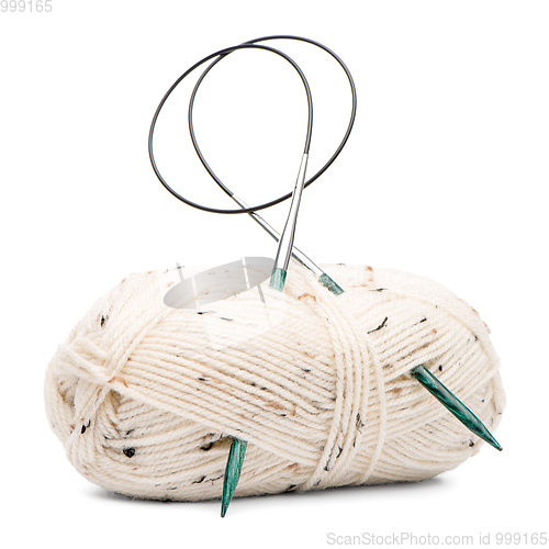 Image of Beige knitting wool with needles