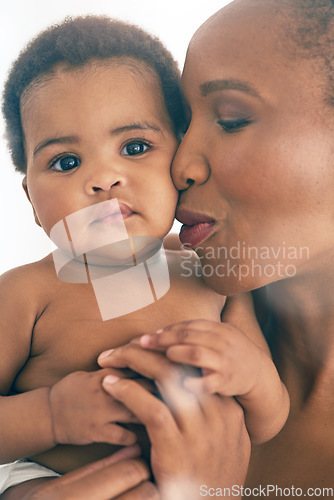 Image of Black woman with baby, face and hug with family, content and bonding with love and early childhood and happiness. African female, mother holding child with parenting, motherhood and cuddle with care