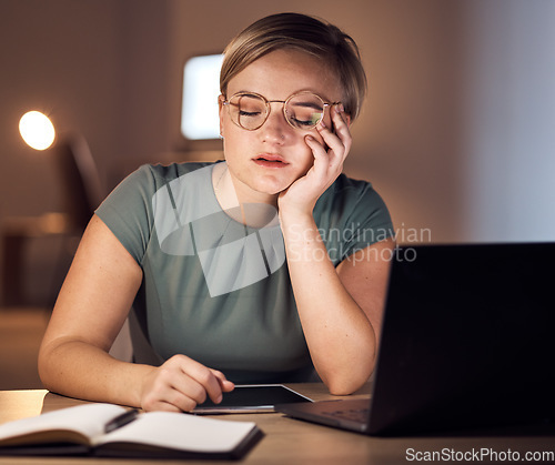 Image of Tired, sleeping and burnout by business woman working at night in office on laptop for deadline, email or proposal. Sleep, exhausted and corporate employee suffering fatigue, workload and pressure