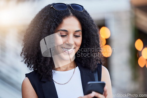 Image of Young black woman, phone and texting in city with smile, online date and social media app for contact. Happy gen z girl, smartphone and internet communication with digital ux, chat and walk in street