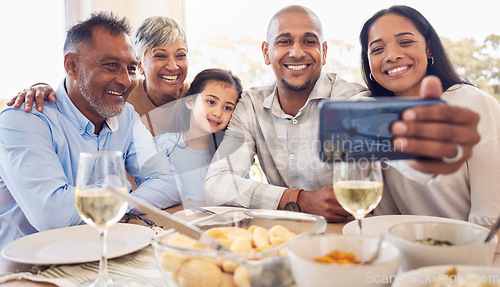 Image of Black family selfie, lunch and smile in home with men, women and girl at table for celebration on web app. Man, smartphone photography and profile picture for social media with kid, parents and woman