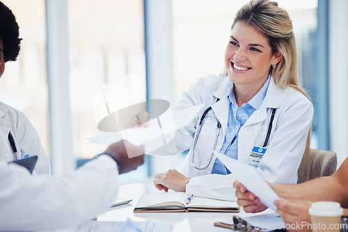 Image of Healthcare, doctors and woman with smile, documents and meeting for planning, admin and conversation. Medical professional, female employee and coworkers with forms, feedback and reports in hospital