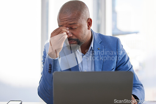 Image of Headache, stress and business man on laptop fatigue, burnout and frustrated for focus, thinking or online problem. Mental health risk, depression and tired employee, manager or person on his computer