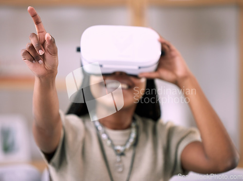 Image of Black woman, pointing and virtual reality glasses for metaverse, smile and games in living room. Vr, Nigerian female and girl in lounge, futuristic and simulation with technology for fun and playful