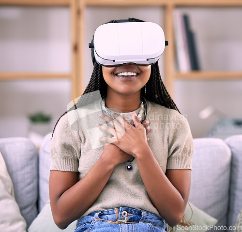 Image of Futuristic, virtual reality glasses and black woman with happiness, hands to chest and living room. Metaverse, Nigerian female and girl with vr, metaverse and gaming with success, achievement or tech