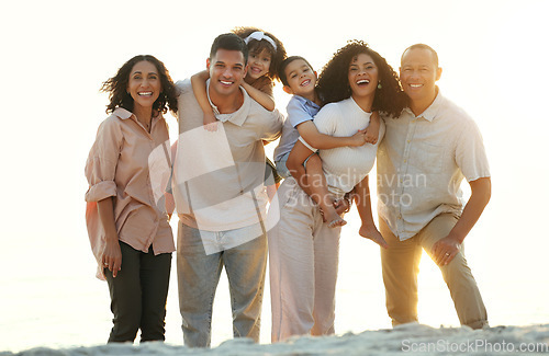 Image of Big family, sunset and portrait smile at beach, having fun and smiling on vacation outdoors. Care, bonding and happy kids, grandmother and grandfather with parents laughing and enjoying holiday time.