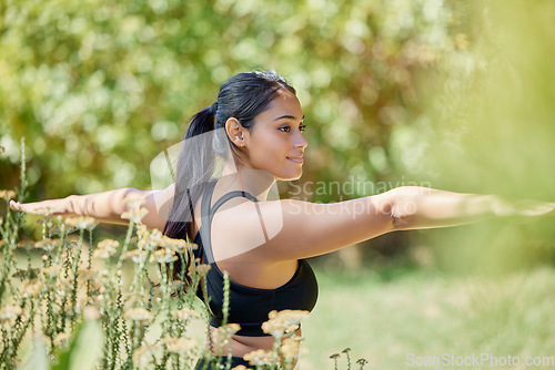 Image of Balance, stretching and yoga by woman in nature for wellness, training and warrior on blurred background. Arm, stretch and girl relax in pilates, mediation and exercise in countryside, zen and peace