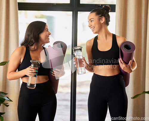 Image of Women or friends talking in yoga class in training gear for fitness, exercise or sports teamwork and wellness. Pilates, meditation and healthy gen z or young people chat of holistic workout together