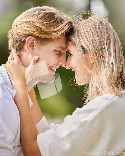 Image of Love, smile and couple with face together for happy, quality time and bond on weekend, vacation and holiday. Dating, engagement and young man and woman calm, relaxing and romantic embrace in park