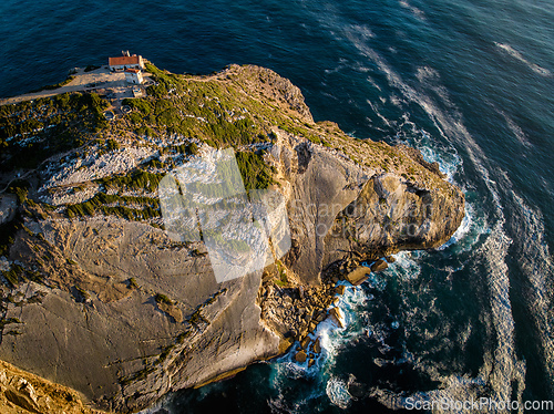 Image of Aerial view of Cabo Espichel cape Espichel on Atlantic ocean at sunset