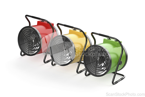 Image of Three electric fan heaters with different colors