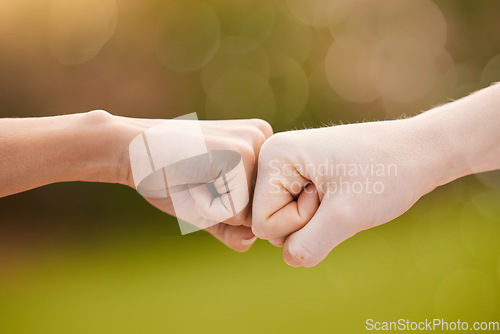 Image of Hands, fist bump and teamwork, support or collaboration for team building, solidarity or unity. Hand connection, partnership or greeting, thank you or motivation for success, goal or targets outdoors